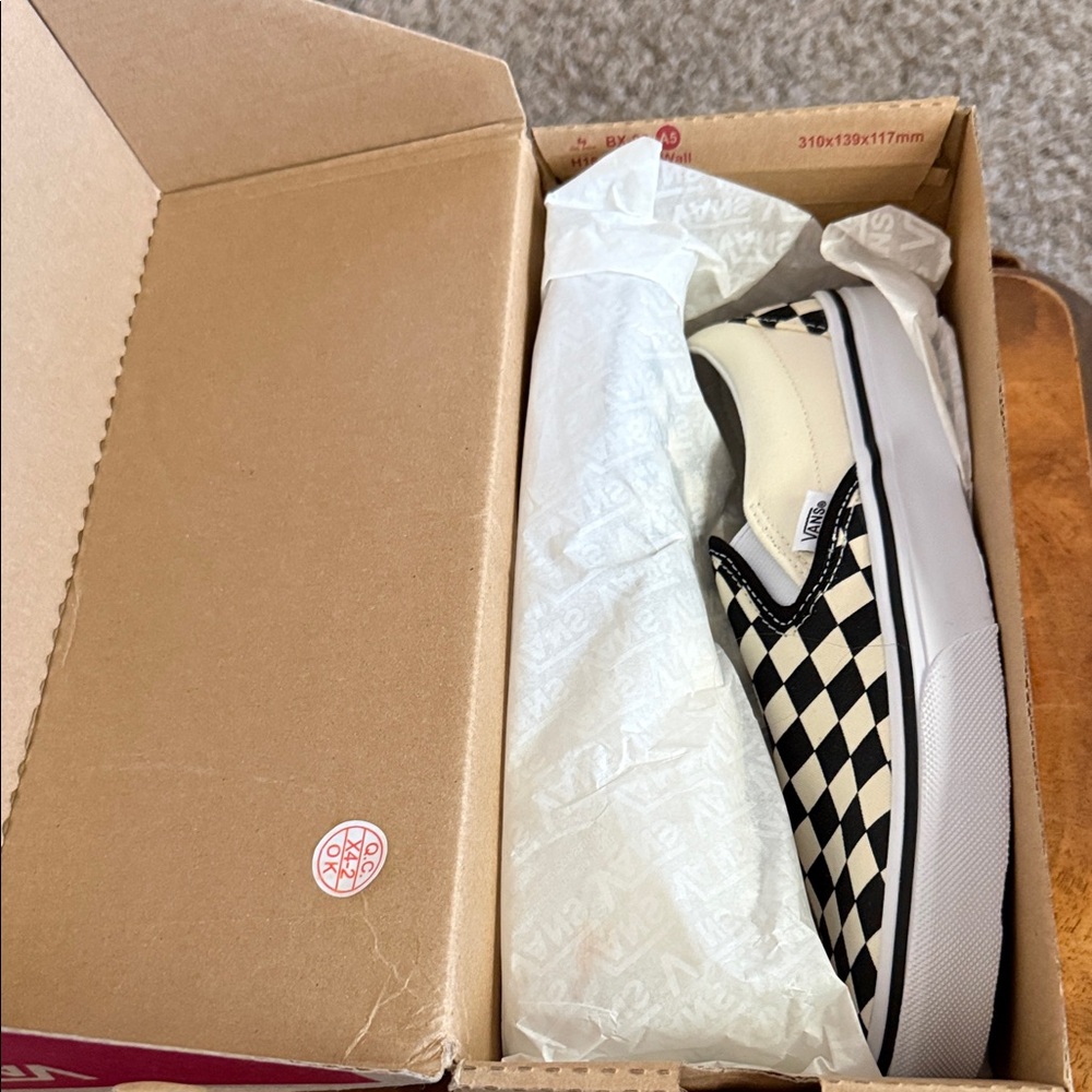 Vans Black and Cream Checkerboard Slip-Ons